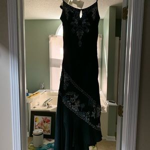 Black CACHE dress with beautiful beading detail;